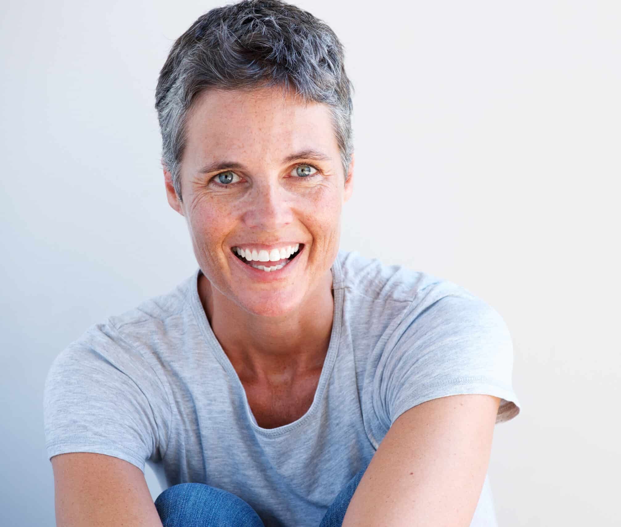 Close-up of older person smiling with healthy teeth
